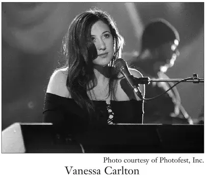 Sheet music: "A Thousand Miles" (Vanessa Carlton) sixteenth-note arpeggios and interval skips