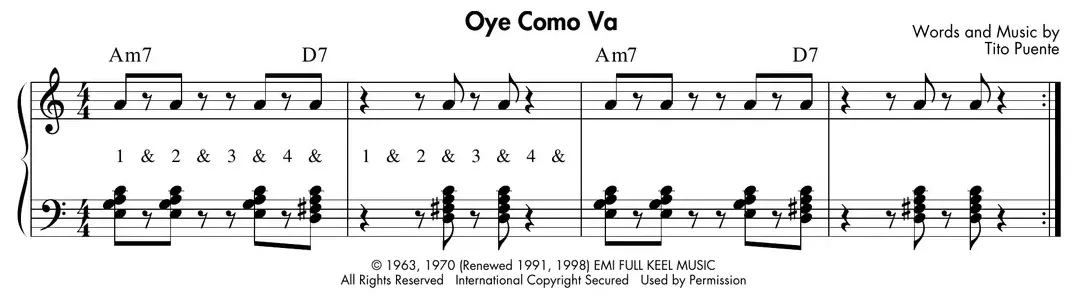 Sheet music: "Oye Como Va" comping figure alternating Am7 and D7