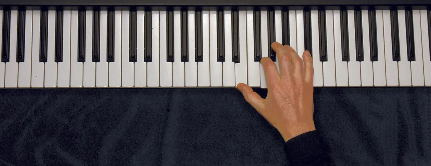 Edim7 chord played on a piano — hand position on the keys